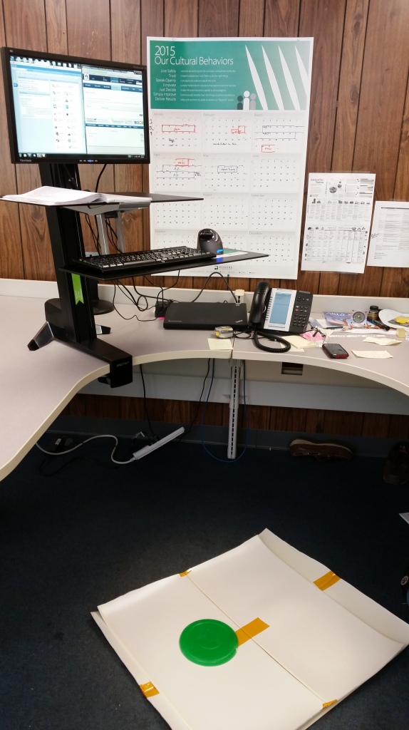 My new standing workstation! You can see on the floor my make shift mat and green polyurethane stand.